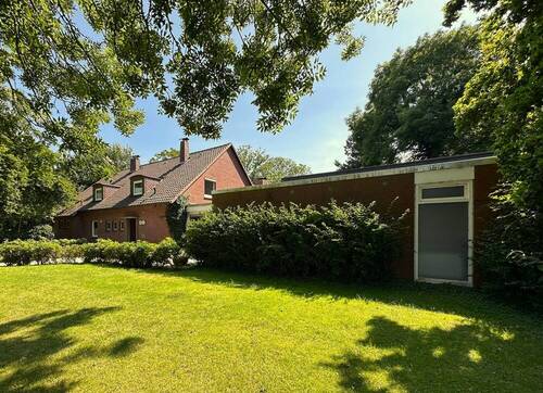 Seitenansicht - Mehrfamilienhaus, Wohnhaus in Wangerland