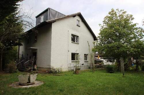 Bild 2 - 9 Zimmer Mehrfamilienhaus, Wohnhaus zum Kaufen in Lohmar