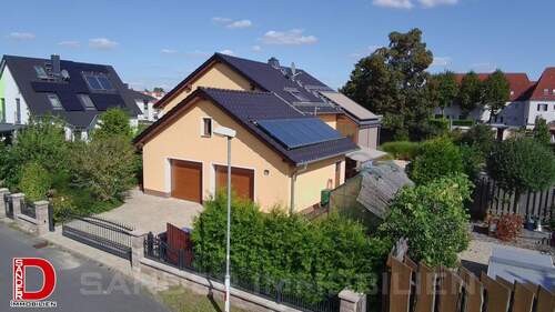 Titelbild - Familienfreundliches Einfamilienhaus mit Pool, Sauna und moderner Haustechnik – Lebensqualität pur