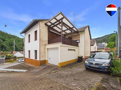 REMAXImmobilien Delux Haus in Saarhölzbach zu verkaufen - REMAX - Familienfreundliches Wohnen mit viel Potenzial