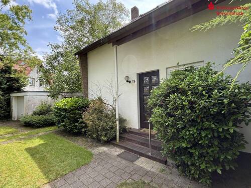 Vorgarten - 8 Zimmer Mehrfamilienhaus, Wohnhaus zum Kaufen in Bramsche