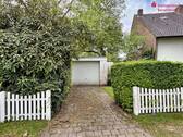 Einfahrt Garage - Mehrfamilienhaus, Wohnhaus mit 227,00 m² in Bramsche zum Kaufen