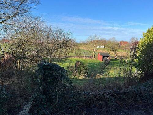 Grundstück - Mehrfamilienhaus, Wohnhaus mit 130,00 m² in Dornum zum Kaufen