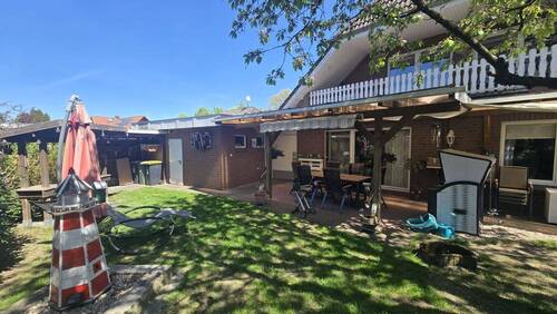 Garten - Mehrfamilienhaus, Wohnhaus mit 256,40 m&sup2; in Wietzendorf zum Kaufen