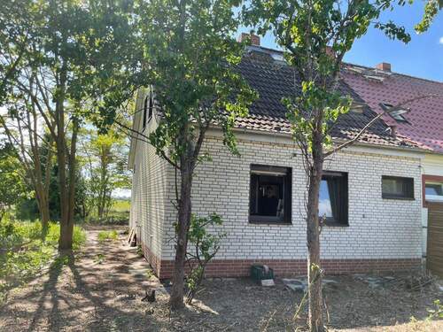 Rückfront des Hauses - Doppelhaushälfte mit 75,00 m² in Ducherow OT Schwerinsburg zum Kaufen