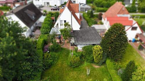 Gartenansicht - 4 Zimmer Einfamilienhaus zum Kaufen in Delmenhorst / Ströhen