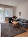 Wohnzimmer - Erdgeschoss Wohnung in zentraler Lage von Harsewinkel