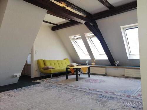 Wohnzimmer DG - 1 Zimmer Mehrfamilienhaus, Wohnhaus in Öhringen