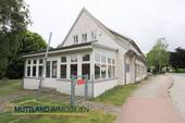 Hausansicht mit Erweiterungsbau - Einfamilienhaus zum Kaufen in Altenpleen