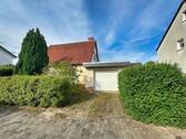Frontansicht und Garage - 5 Zimmer Einfamilienhaus zum Kaufen in Achim