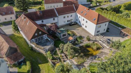 Immobilienansicht - Vielseitiges Anwesen mit modernisiertem Fachwerkhaus, drei stilvollen Wohnungen, Gewerbeeinheit und großzügigem Grund...