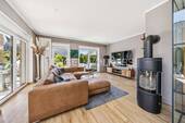 Wohnbereich mit Kamin - Einfamilienhaus mit 188,70 m&sup2; in Stapelfeld zum Kaufen