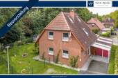 Titelbild - Familienfreundliches Einfamilienhaus in Sillenstede - kurze Wege, gepflegtes Zuhause
