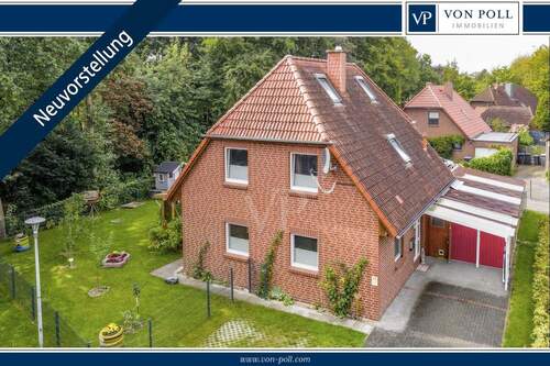 Titelbild - Familienfreundliches Einfamilienhaus in Sillenstede - kurze Wege, gepflegtes Zuhause