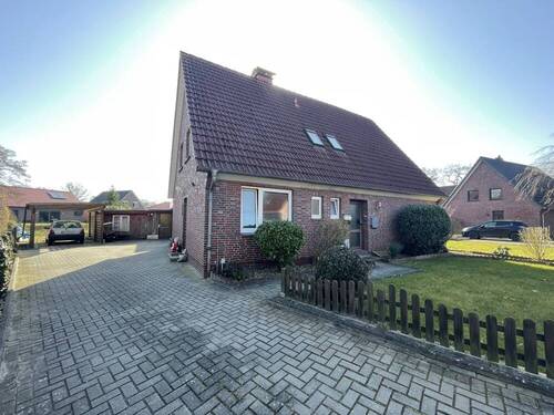 Auffahrt - Mehrfamilienhaus, Wohnhaus mit 140,00 m² in Schortens zum Kaufen
