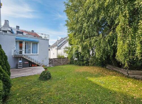 Gartenansicht - In zentraler Lage von Neu-Anspach - flexibel nutzbares, solides Wohn- und Geschäftshaus mit Garage