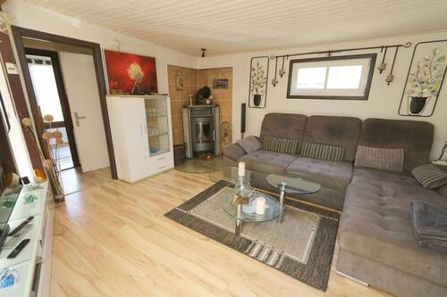 Wohnzimmer - 4 Zimmer Mehrfamilienhaus, Wohnhaus zum Kaufen in Scharbeutz / Pönitz am See
