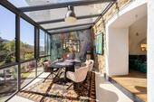 Wintergarten mit Ausblick. - Einfamilienhaus mit 360,00 m&sup2; in Neubeuern zum Kaufen