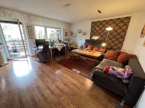 Wohnzimmer - Etagenwohnung mit 81,90 m² in Schortens zum Kaufen