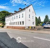 Wohn- & Geschäftshaus mit 4 Einheiten, Gaststätte & 9 Stellplätzen in Bogel