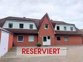 Eingangsansicht - Solide vermietete Dachgeschosswohnung in idyllischer Lage