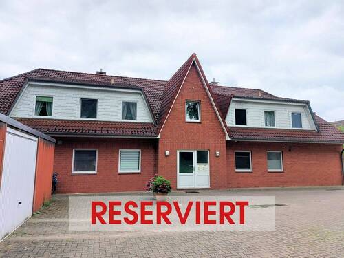 Eingangsansicht - Solide vermietete Dachgeschosswohnung in idyllischer Lage