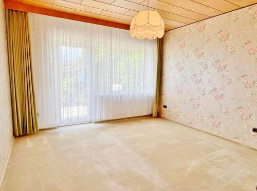 Einliegerwohnung: Schlafzimmer mit Terrassenzugang - 