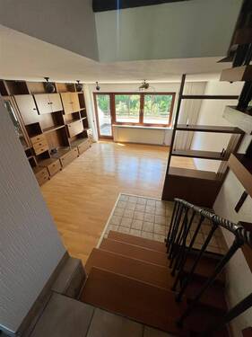 Wohnzimmer mit Südbalkon EG - 