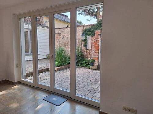 Terrassentür aus der Wohnküche - Einfamilienhaus mit 104,00 m&sup2; in Gransee zum Kaufen