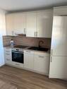Küche mit EBK - Neuwertige Wohnung in Flieden mit viel Platz