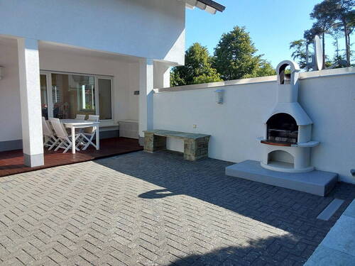Terrasse mit Außenkamin - 