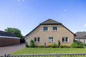 Straßenansicht - Einfamilienhaus mit 235,00 m² in Bassum zum Kaufen