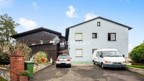 Außenansicht 1 - Liegenschaft mit 2 Wohnhäusern, Gewächshäusern und großem Grundstück