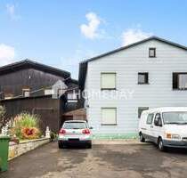 Liegenschaft mit 2 Wohnhäusern, Gewächshäusern und großem Grundstück - Lollar Salzböden