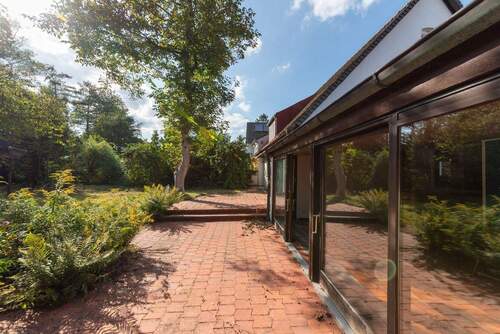 online - AIGNER - Familiengerechtes Haus mit Ausbaupotenzial auf parkähnlichem Grundstück