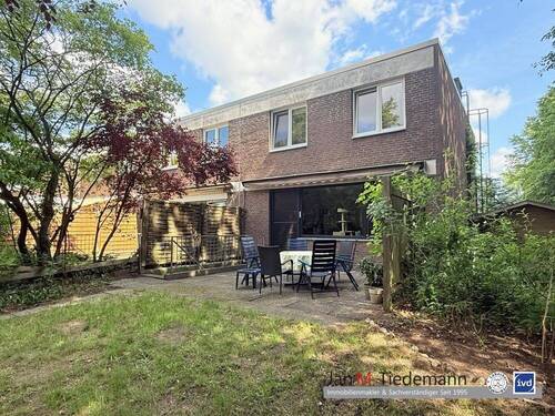 rückwärtige Ansicht - Familienreihenendhaus mit 4 Zimmern, mit Vollkeller, Garage auf Eigenland