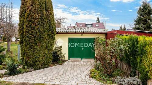 Garage - 6 Zimmer Einfamilienhaus zum Kaufen in Vogtei