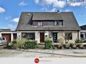 Doppelhaus zu verkaufen in Bremen Obervieland – H & T Immobilien - Mehrgenerationenhaus mit großem Garten und Garage!