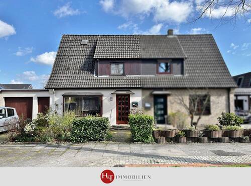 Doppelhaus zu verkaufen in Bremen Obervieland – H & T Immobilien - Mehrgenerationenhaus mit großem Garten und Garage!