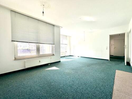 Wohnzimmer - 3 Zimmer Etagenwohnung in Neuss