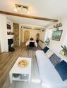 Wohnzimmer Ansicht mit Essbere - 