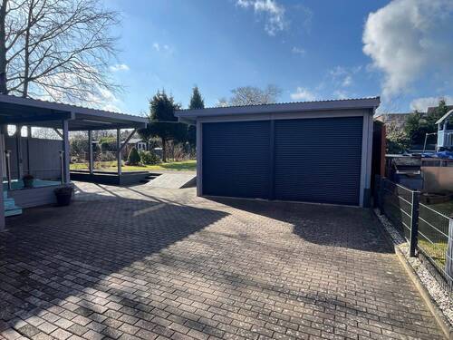 Doppelgarage mit Werkstatt- und Lagerfläche - 