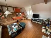 Wohnzimmer Dachgeschoss mit Kamin - 