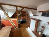 Wohnzimmer Dachgeschoss mit Kamin - 