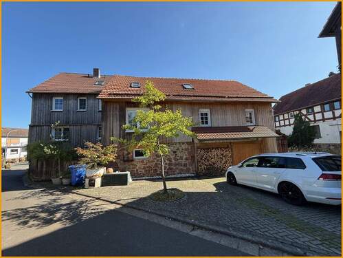 Hinteransicht - 5 Zimmer Einfamilienhaus zum Kaufen in Gilserberg