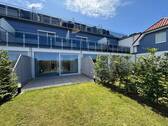 Blick vom Gartenanteil auf die Terrasse - 3 Zimmer Etagenwohnung in Ostseebad Ahrenshoop