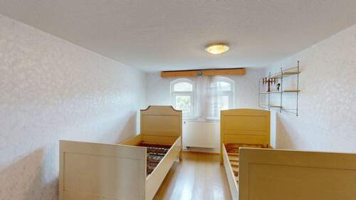 Schlafzimmer im Dachgeschoss - 