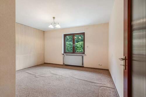 Schlafzimmer 1 im Erdgeschoss - 