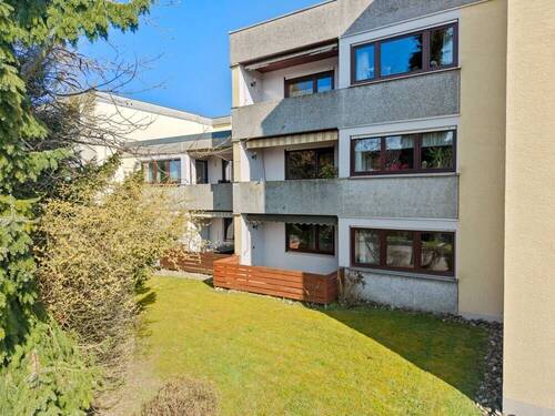 Ansicht Haus- Rückseite mit Balkon - Etagenwohnung mit 92,90 m&sup2; in Friedrichshafen zum Kaufen