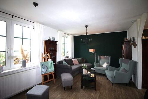 Wohnzimmer - 3 Zimmer Mehrfamilienhaus, Wohnhaus zum Kaufen in Krummendeich